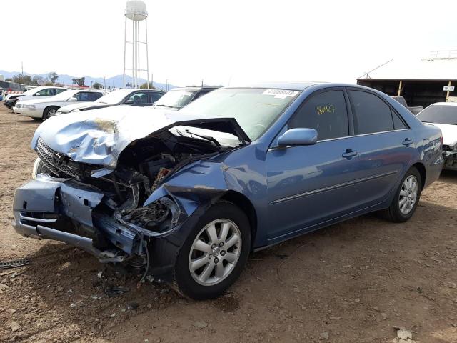 TOYOTA CAMRY LE 2002 with VIN JTDBF30K920009129 - Photo from auction