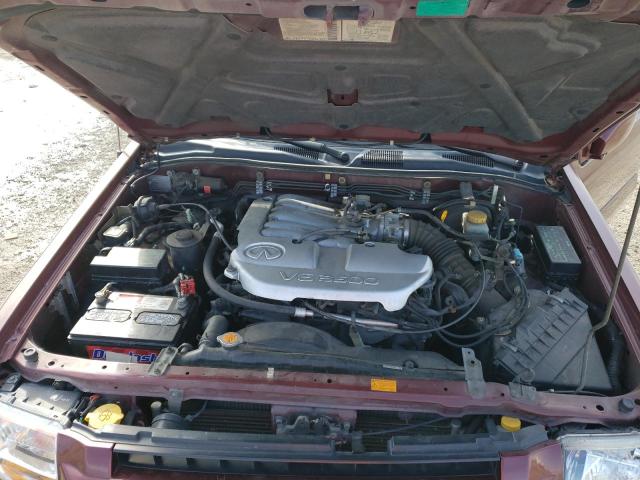 Photo 12 from auction – 2002 INFINITI QX4 with VIN JNRDR09Y02W256381
