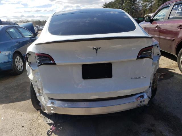 Photo 6 from auction – 2021 TESLA MODEL Y with VIN 5YJYGDEF0MF073086