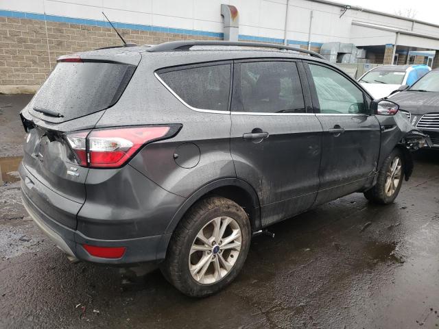 Photo 3 from auction – 2017 FORD ESCAPE SE with VIN 1FMCU9GD3HUE62146
