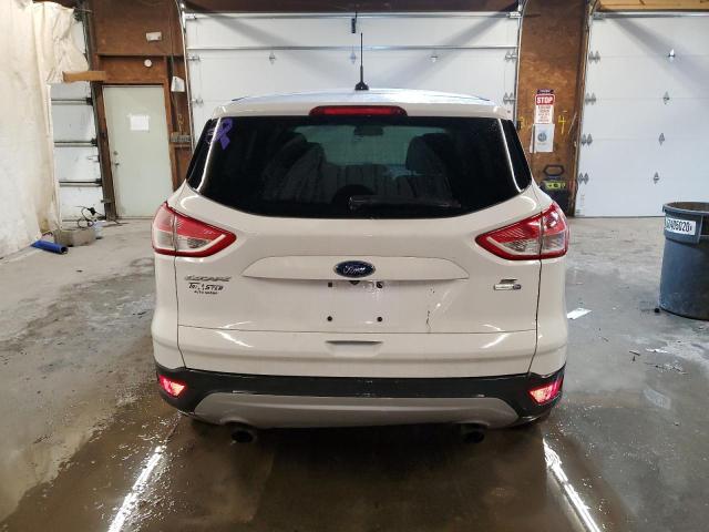 Photo 6 from auction – 2016 FORD ESCAPE SE with VIN 1FMCU9GX7GUB42840