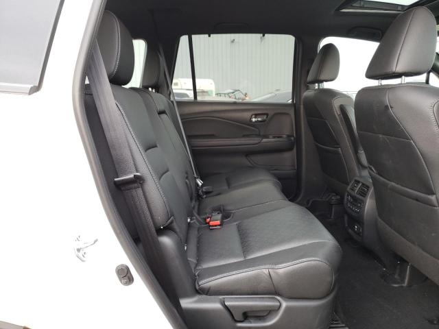 Photo 11 from auction – 2021 HONDA PASSPORT E with VIN 5FNYF8H03MB034140