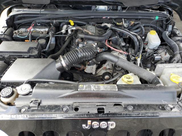Photo 11 from auction – 2011 JEEP WRANGLER U with VIN 1J4BA5H19BL633835