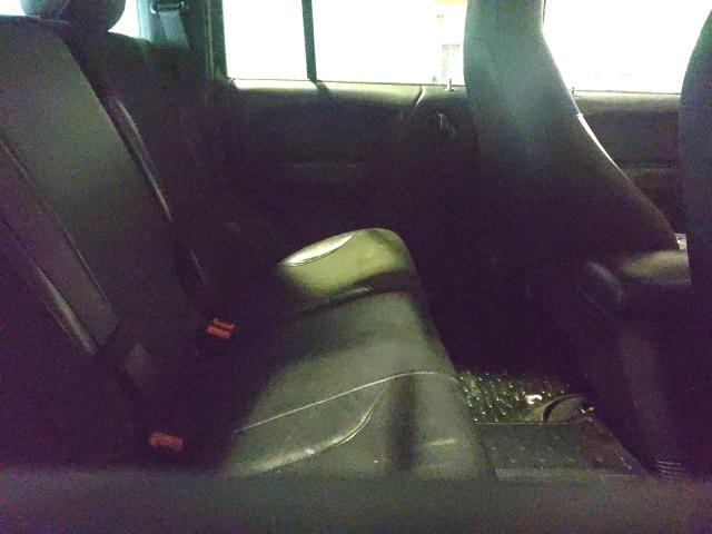 Photo 11 from auction – 2003 JEEP LIBERTY RE with VIN 1J4GL38K63W675439