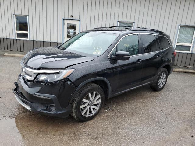 HONDA PILOT 2020 with VIN 5FNYF6H5XLB001134 - Photo from auction