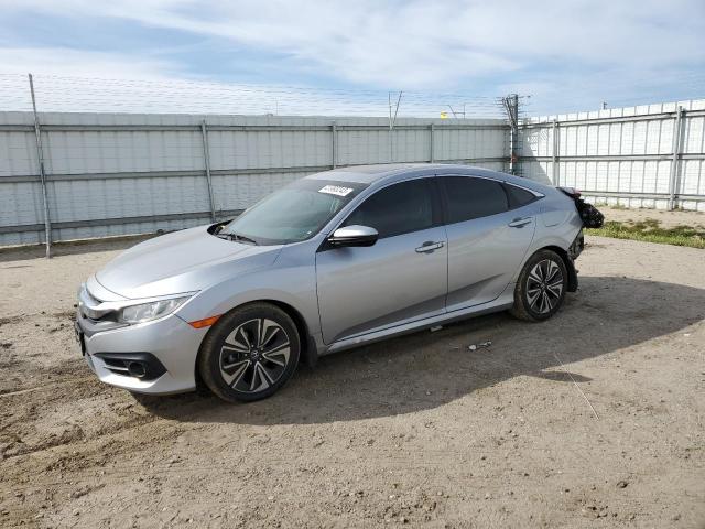 HONDA CIVIC EXL 2016 with VIN 2HGFC1F75GH655371 - Photo from auction