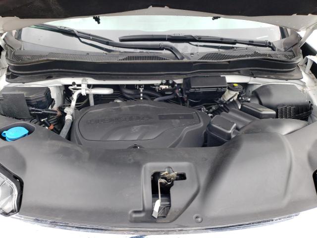 Photo 11 from auction – 2021 HONDA PILOT TOUR with VIN 5FNYF5H67MB021023