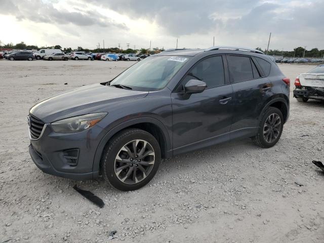 MAZDA CX-5 GT 2016 with VIN JM3KE2DY1G0688713 - Photo from auction