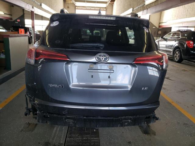 Photo 6 from auction – 2018 TOYOTA RAV4 LE with VIN JTMZFREV5JJ166511