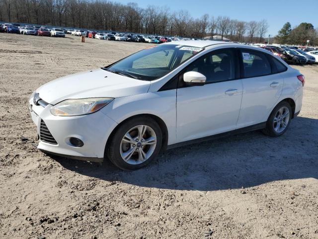 FORD FOCUS SE 2014 with VIN 1FADP3F20EL418772 - Photo from auction