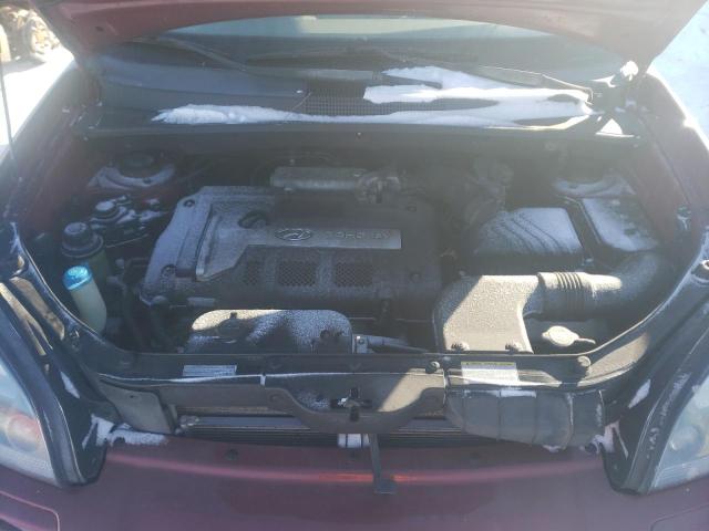 Photo 11 from auction – 2005 HYUNDAI TUCSON GL with VIN KM8JM12B95U119612