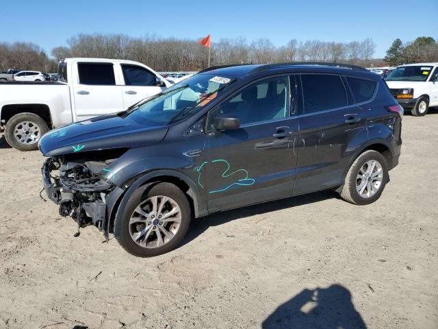 FORD ESCAPE SE 2017 with VIN 1FMCU0GD8HUD85933 - Photo from auction
