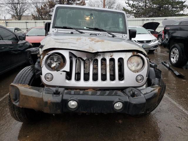 Photo 5 from auction – 2014 JEEP WRANGLER U with VIN 1C4BJWDG6EL155027