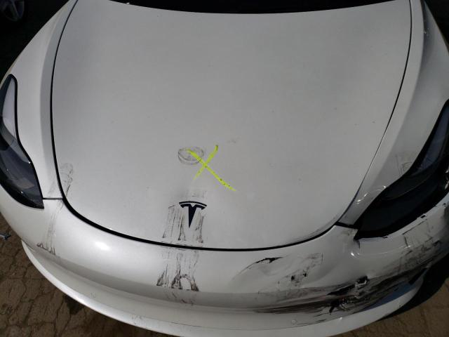 Photo 11 from auction – 2022 TESLA MODEL 3 with VIN 5YJ3E1EB7NF119803