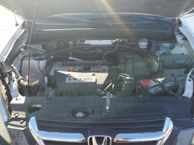 Photo 11 from auction – 2004 HONDA CR-V LX with VIN JHLRD68424C011434