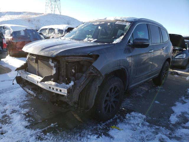 HONDA PILOT TOUR 2020 with VIN 5FNYF6H96LB003983 - Photo from auction