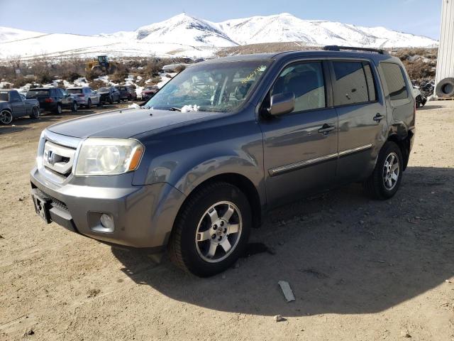 HONDA PILOT TOUR 2011 with VIN 5FNYF4H97BB103853 - Photo from auction