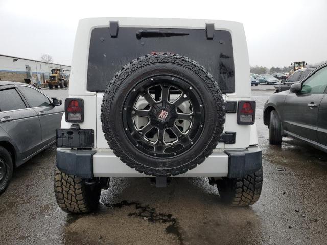 Photo 6 from auction – 2014 JEEP WRANGLER U with VIN 1C4BJWEG1EL230201