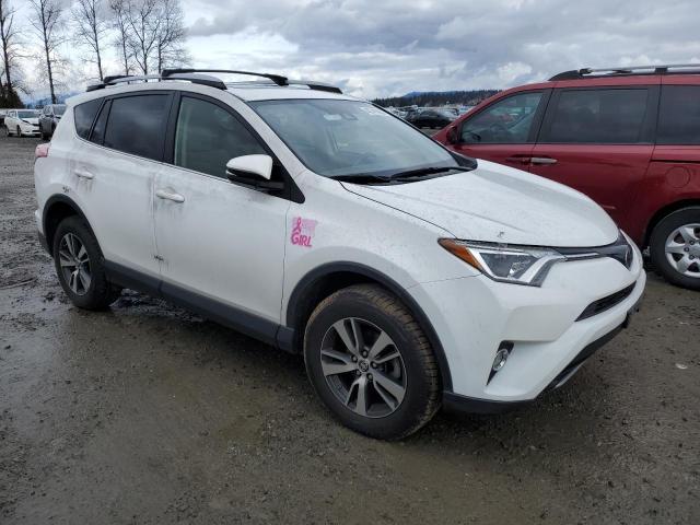 Photo 4 from auction – 2017 TOYOTA RAV4 XLE with VIN JTMRFREV5HD203954