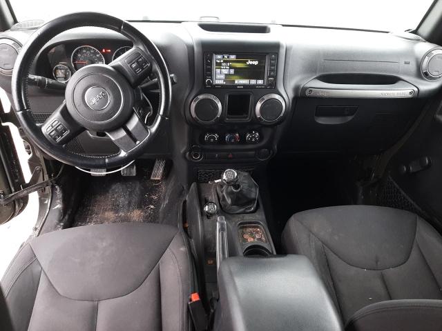 Photo 8 from auction – 2015 JEEP WRANGLER U with VIN 1C4BJWDG7FL676291
