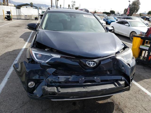 Photo 5 from auction – 2017 TOYOTA RAV4 XLE with VIN JTMWFREV0HJ138130