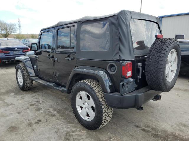 Photo 2 from auction – 2011 JEEP WRANGLER U with VIN 1J4BA5H19BL633835