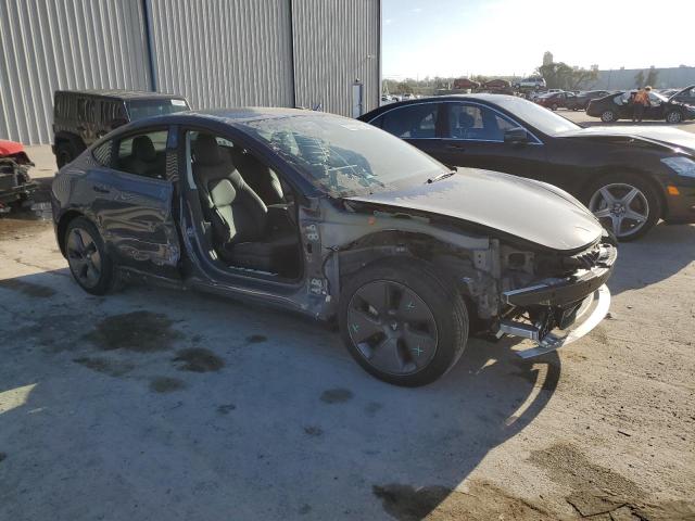 Photo 4 from auction – 2022 TESLA MODEL 3 with VIN 5YJ3E1EA9NF102668