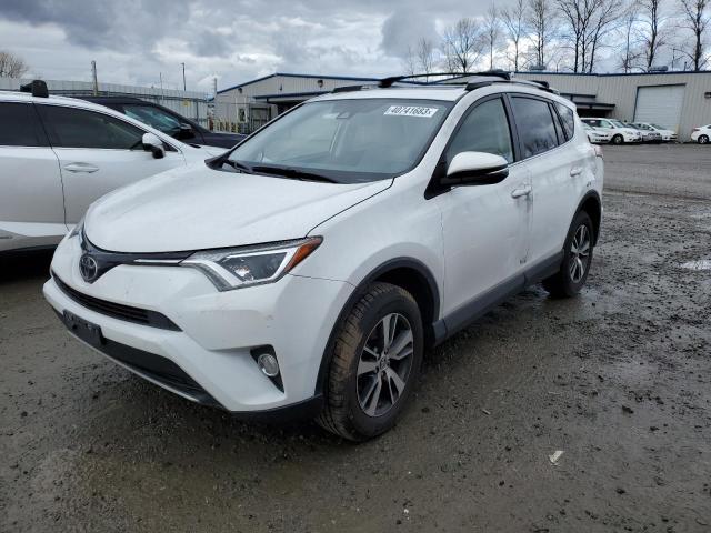 TOYOTA RAV4 XLE 2017 with VIN JTMRFREV5HD203954 - Photo from auction