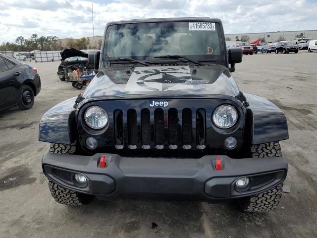 Photo 5 from auction – 2011 JEEP WRANGLER U with VIN 1J4BA5H19BL633835