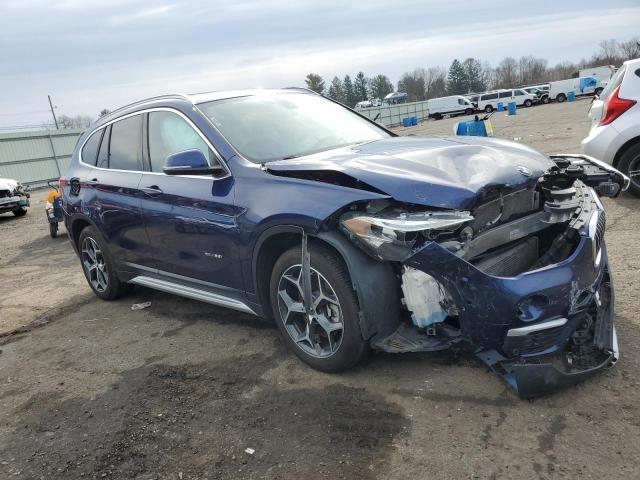 Photo 4 from auction – 2017 BMW X1 XDRIVE2 with VIN WBXHT3C38H5F75744