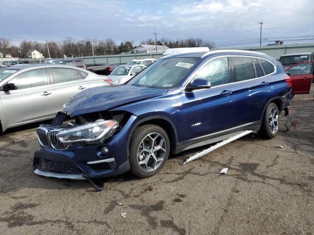 BMW X1 XDRIVE2 2017 with VIN WBXHT3C38H5F75744 - Photo from auction
