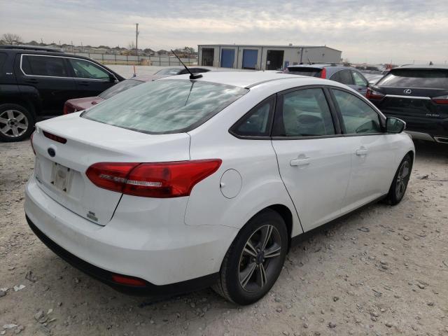 Photo 3 from auction – 2016 FORD FOCUS SE with VIN 1FADP3FE1GL404828