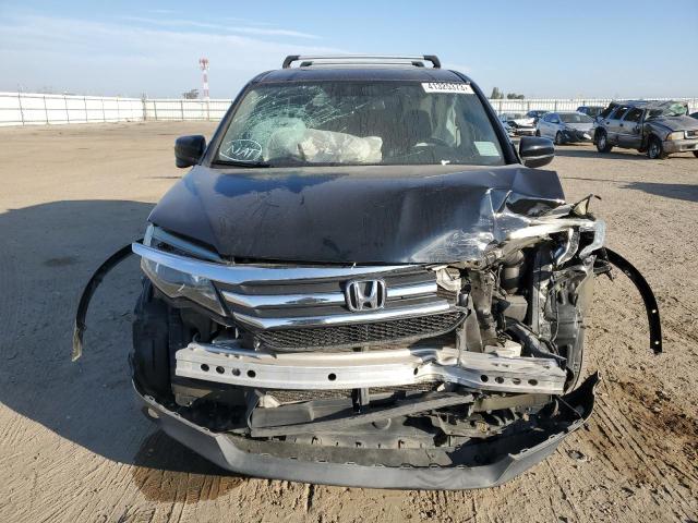 Photo 5 from auction – 2016 HONDA PILOT EXL with VIN 5FNYF5H50GB004544