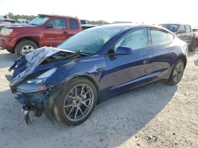 TESLA MODEL 3 2022 with VIN 5YJ3E1EA7NF309561 - Photo from auction