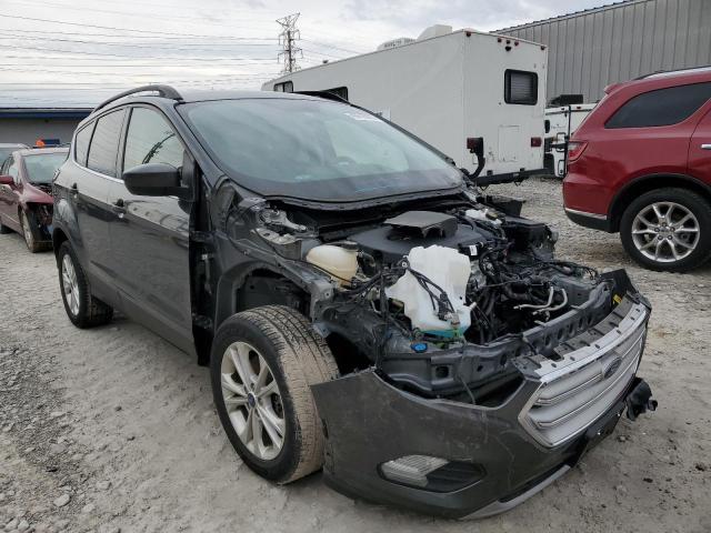 Photo 4 from auction – 2018 FORD ESCAPE SE with VIN 1FMCU9GD0JUB81377