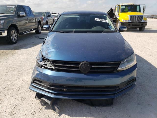 Zdjęcie 5 z aukcji – 2017 VOLKSWAGEN JETTA SE z VIN 3VWDB7AJ0HM361925