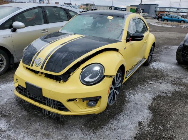 Photo 2 from auction – 2014 VOLKSWAGEN BEETLE TUR with VIN 3VWVS7ATXEM604352