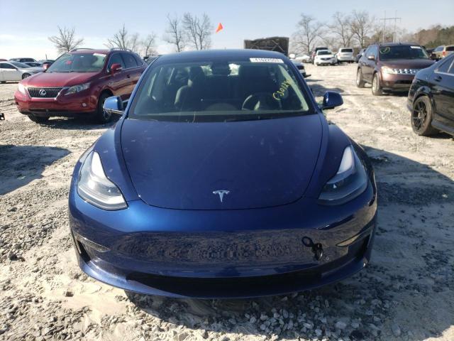 Photo 5 from auction – 2022 TESLA MODEL 3 with VIN 5YJ3E1EB3NF104621