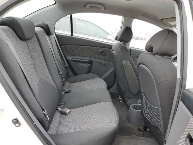 Photo 10 from auction – 2010 KIA RIO LX with VIN KNADH4A3XA6661265
