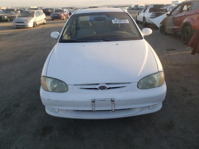 Photo 5 from auction – 1998 KIA SEPHIA BAS with VIN KNAFB1211W5750483