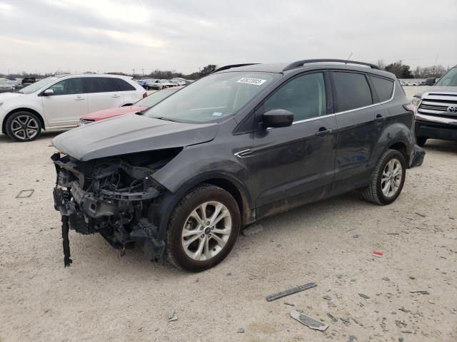 FORD ESCAPE SE 2018 with VIN 1FMCU0GD9JUA84254 - Photo from auction