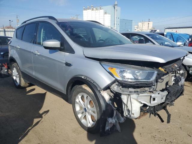 Photo 4 from auction – 2018 FORD ESCAPE SE with VIN 1FMCU9GD3JUB29399