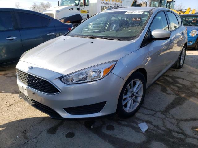 FORD FOCUS SE 2018 with VIN 1FADP3K20JL282031 - Photo from auction