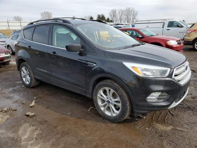 Photo 4 from auction – 2018 FORD ESCAPE SE with VIN 1FMCU0GD1JUA74477