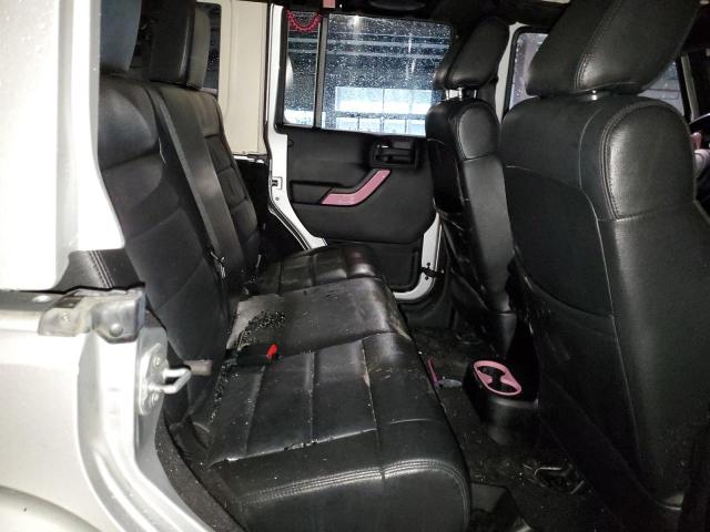 Photo 10 from auction – 2011 JEEP WRANGLER U with VIN 1J4BA5H14BL563581