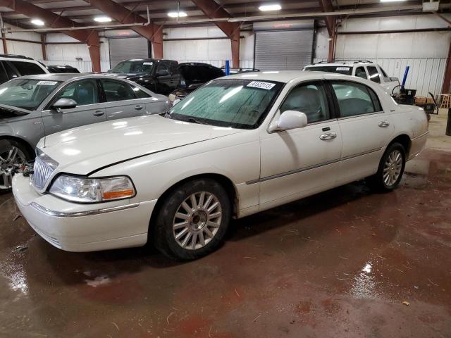 Photo 1 from auction – 2004 LINCOLN TOWN CAR E with VIN 1LNHM81W84Y674277