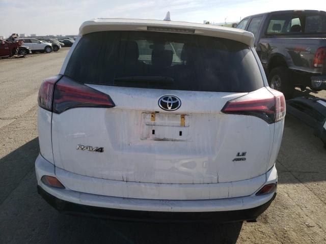 Photo 6 from auction – 2018 TOYOTA RAV4 LE with VIN 2T3BFREV2JW764526