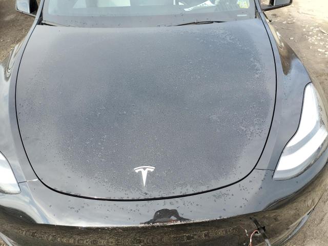 Photo 11 from auction – 2022 TESLA MODEL Y with VIN 7SAYGDEE3NF443541