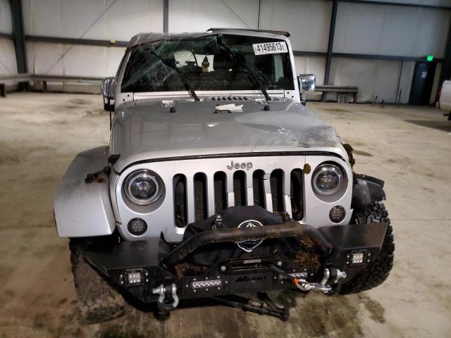Photo 5 from auction – 2011 JEEP WRANGLER U with VIN 1J4BA5H14BL563581