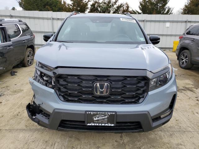 Photo 5 from auction – 2022 HONDA PASSPORT E with VIN 5FNYF8H07NB010750